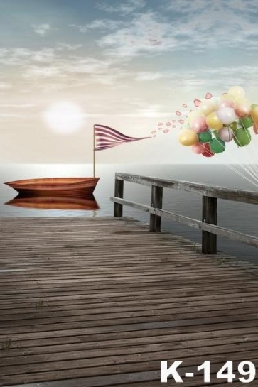 Colorful Balloons Small Boat Beach Sunset Wedding Backdrop