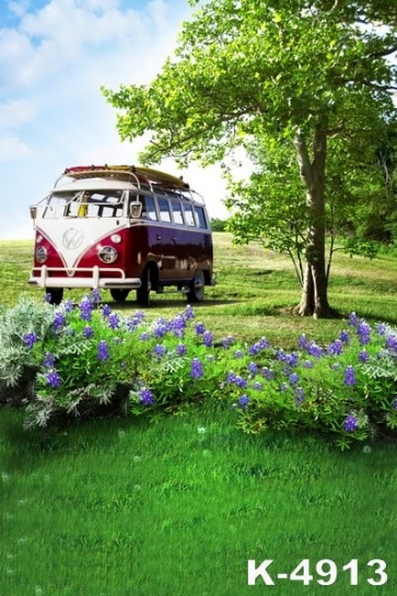 Tourist Bus in Green Grassland by Green Trees Photo Wall Backdrop