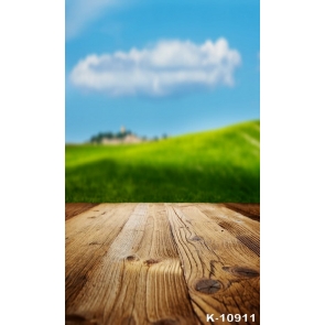 White Clouds above Green Grassland Wood Photo Drop Background