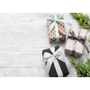 Small Gift Boxes on Wood Floor Background Drops for Photography for Christmas